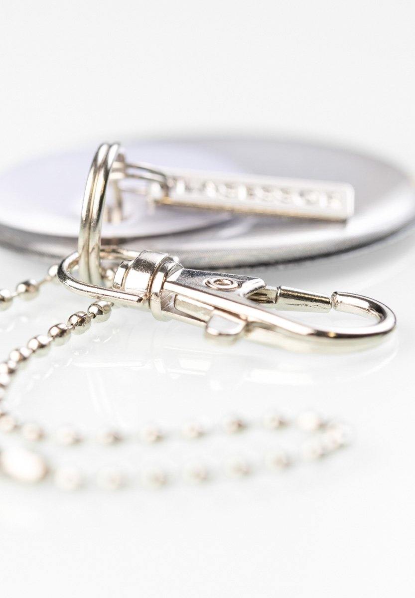 Ympyrät Lasessor Koruheijastin-heijastin-lähikuva-klipsistä