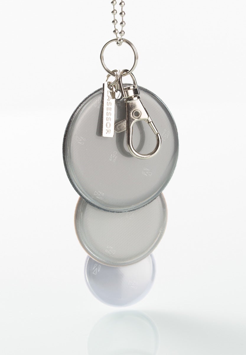 Ympyräsetti Lasessor Koruheijastin-heijastin-roikkumassa