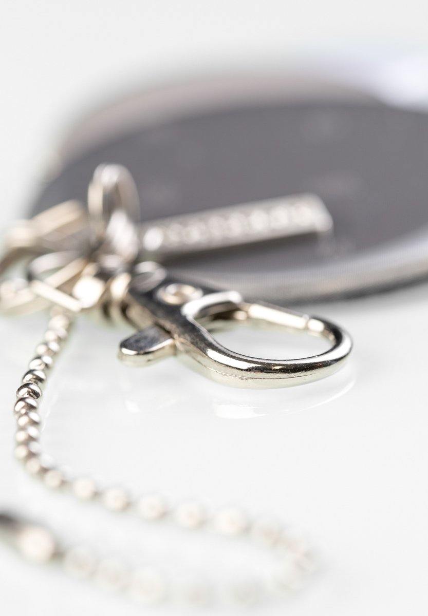 Ympyräsetti Lasessor Koruheijastin-heijastin-lähikuva-klipsistä