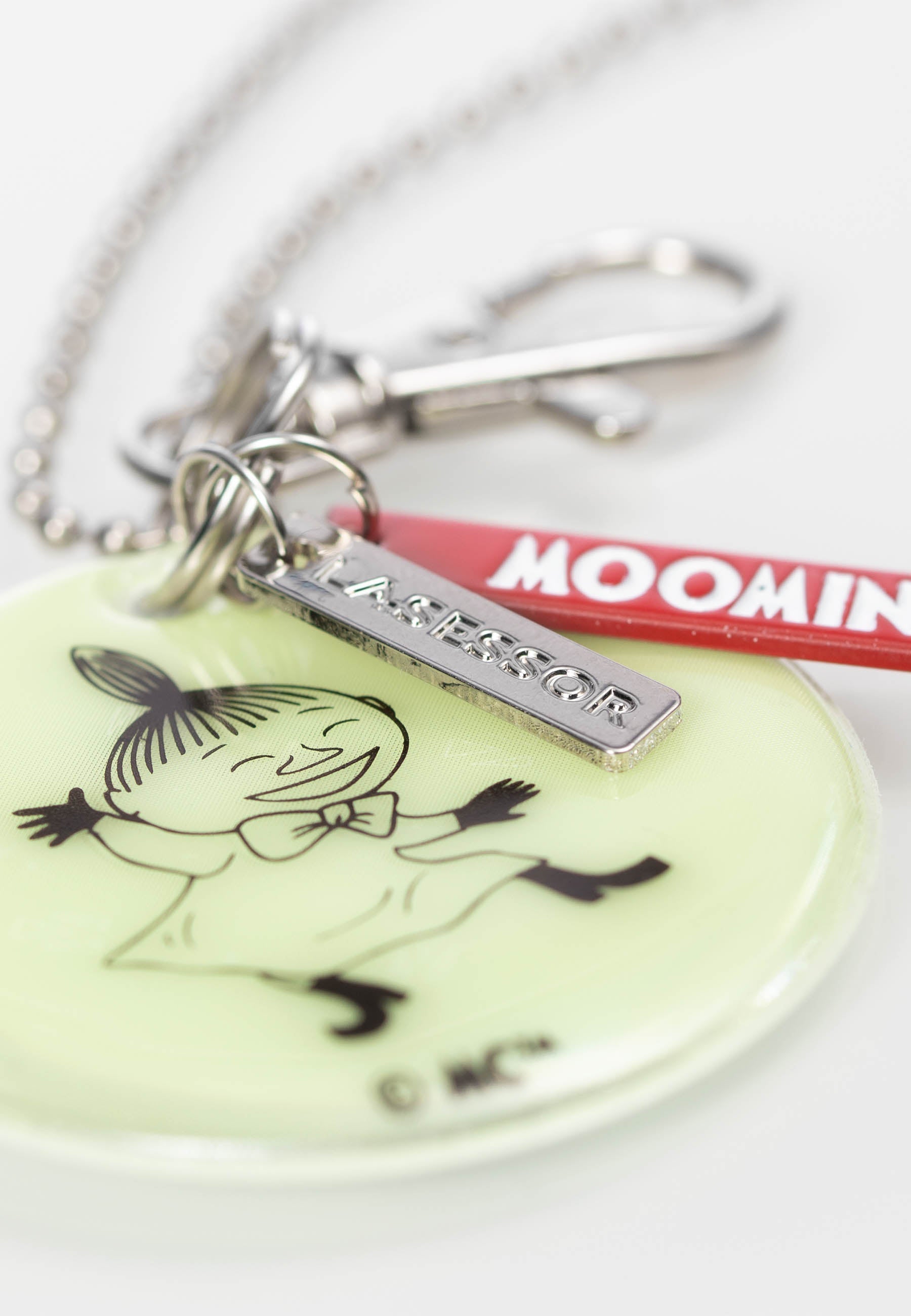 Lasessor Design Muumi Koruhohtoheijastin 4 Pikku myy lasten heijastin vihreä B2